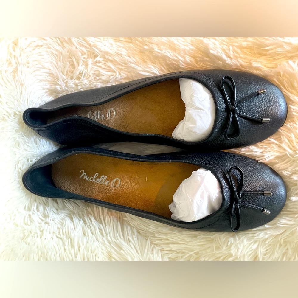 Black leather flats